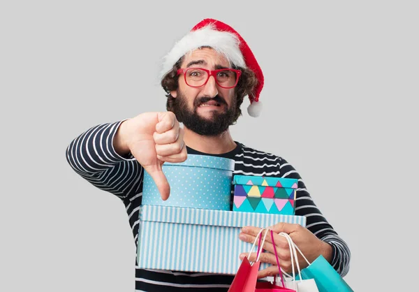 クリスマス プレゼントの買い物袋と狂った若者 — ストック写真