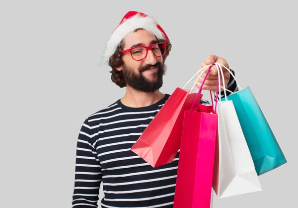 Junger Verrückter Mann Mit Einkaufstüten Weihnachtskonzept — Stockfoto