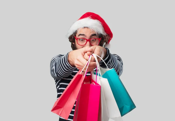 Ung Galen Man Med Shoppingkassar Jul Konceptet — Stockfoto