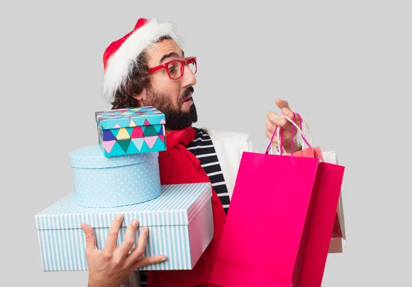 Junger Verrückter Mit Weihnachtsgeschenken Und Einkaufstaschen — Stockfoto