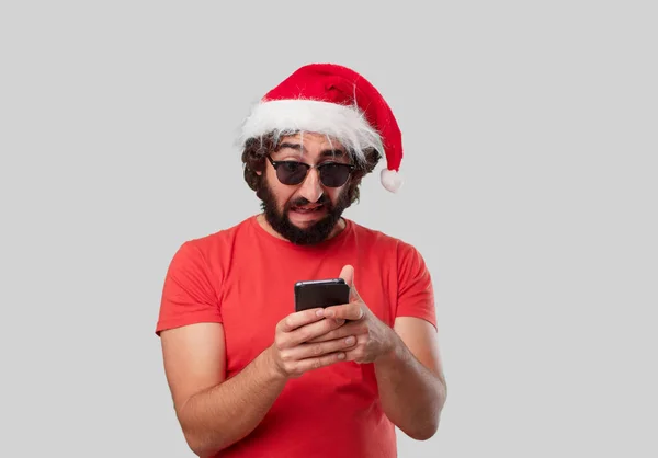 Őrült Fiatalember Mozgatható Telefon Karácsonyi Concept — Stock Fotó