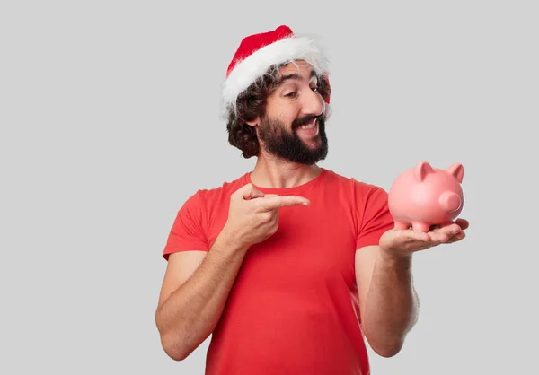 Piggybank と若い狂気の人 クリスマス コンセプト — ストック写真