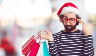Noel Baba şapkası genç adam. Noel kavramı.