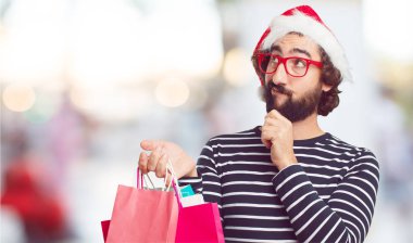 Noel Baba şapkası genç adam. Noel kavramı.