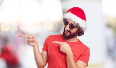 Noel Baba şapkası genç adam. Noel kavramı.