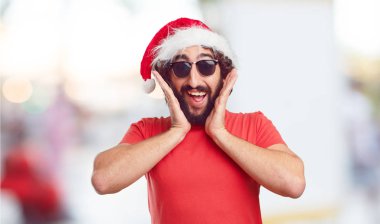 Noel Baba şapkası genç adam. Noel kavramı.