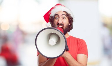 Noel Baba şapkası genç adam. Noel kavramı.