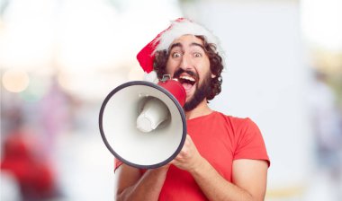 Noel Baba şapkası genç adam. Noel kavramı.