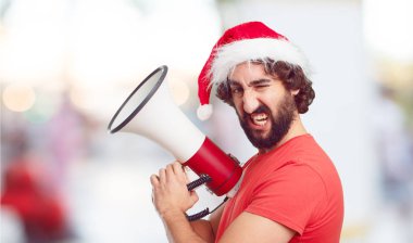 Noel Baba şapkası genç adam. Noel kavramı.