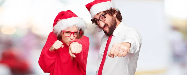 クリスマス コンセプトは表現する若いカップル カップルと異なるレイヤーの背景 — ストック写真