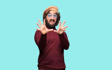 Fransız sanatçı bir bere ile katılmıyorum poz