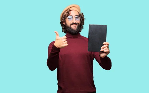 French artist with a beret holding a book