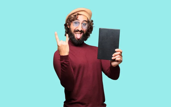 French artist with a beret holding a book