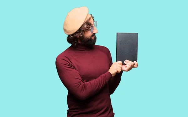 French artist with a beret holding a book