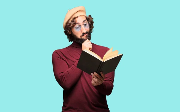 French artist with a beret holding a book