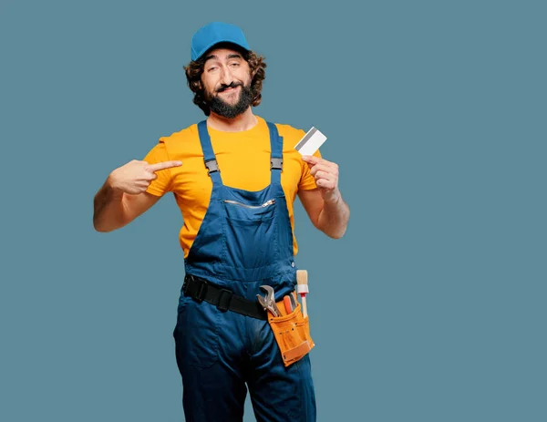 Klusjesman werknemer met een creditcard — Stockfoto