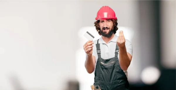 Young Man Worker Credit Card — Stock Photo, Image
