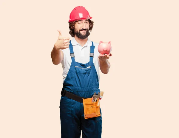 Jonge Man Werknemer Met Een Spaarvarken Bank — Stockfoto