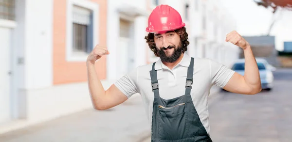 Young Man Worker Strong Pose — Stock Photo, Image