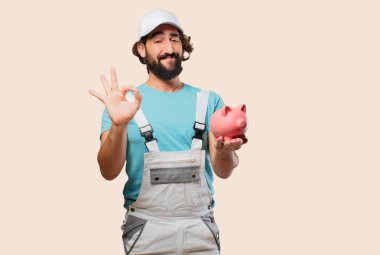 bir kumbara ile profesyonel ressam