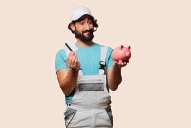 bir kumbara ile profesyonel ressam