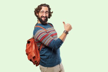 Tamam ya da tamam işareti olan genç hippi.