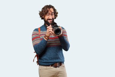 Genç hippi fotoğrafçı.