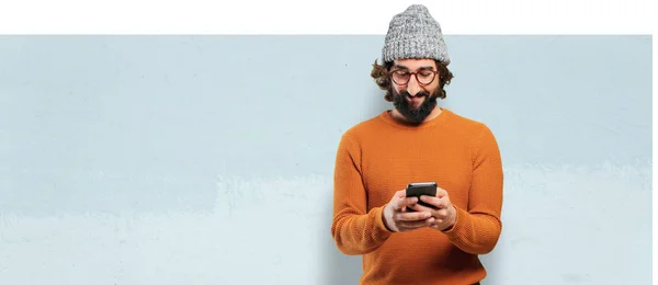 Jonge Man Met Baard Met Een Smartphone — Stockfoto
