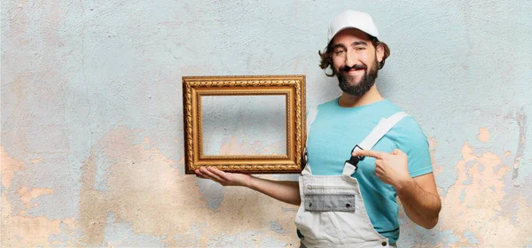 Professional Painter Holding Baroque Frame — Stock Photo, Image