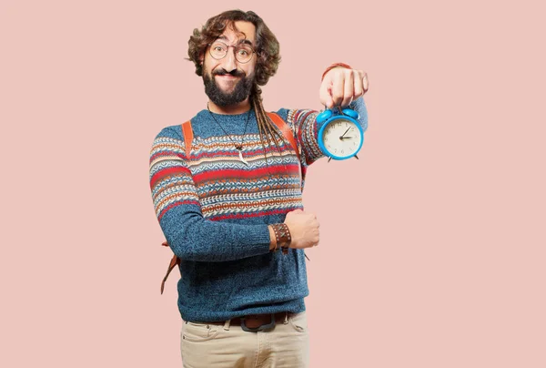 Young hippie man with an alarm clock — 스톡 사진