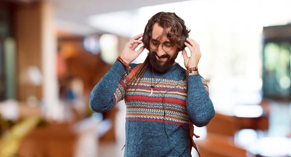 Young hippie man listening music — Stock Photo, Image