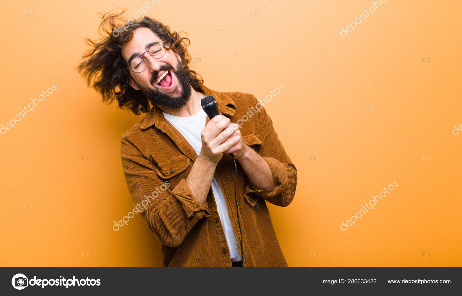 Young Man With Crazy Hair In Motion Singing Stock Photo C Kues
