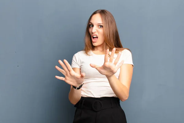 Young Pretty Woman Feeling Terrified Backing Screaming Horror Panic Reacting — Stockfoto