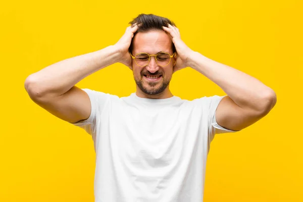 Young Handsome Man Feeling Stressed Frustrated Raising Hands Head Feeling — Stock Photo, Image
