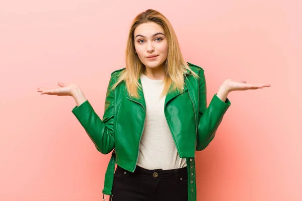 Young Pretty Blonde Woman Feeling Puzzled Confused Doubting Weighting Choosing — Stock Photo, Image