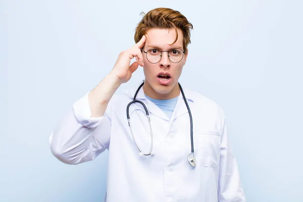 Young Red Head Doctor Looking Surprised Open Mouthed Shocked Realizing — Stock Photo, Image
