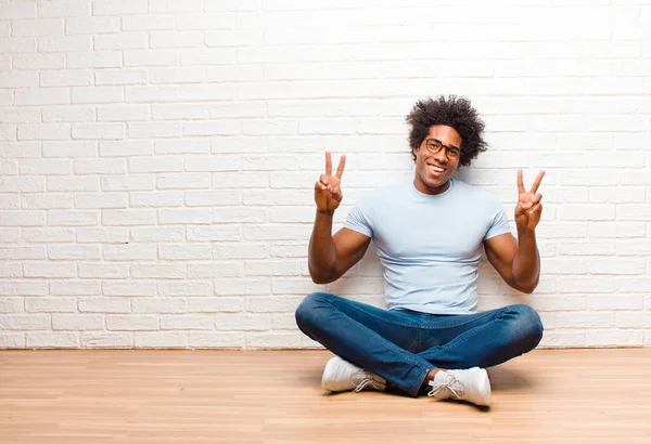 Young Black Man Smiling Looking Happy Friendly Satisfied Gesturing Victory — Stock Photo, Image
