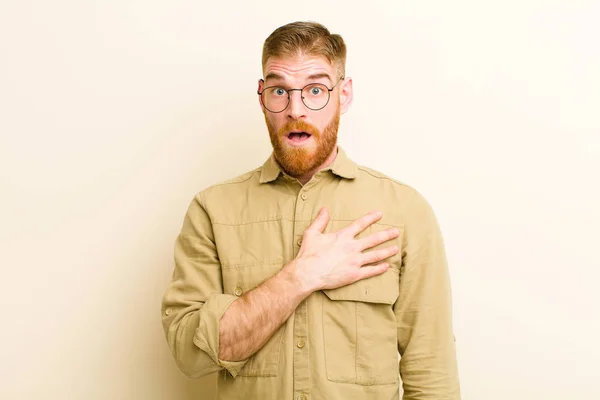Young Red Head Man Feeling Shocked Astonished Surprised Hand Chest — 스톡 사진