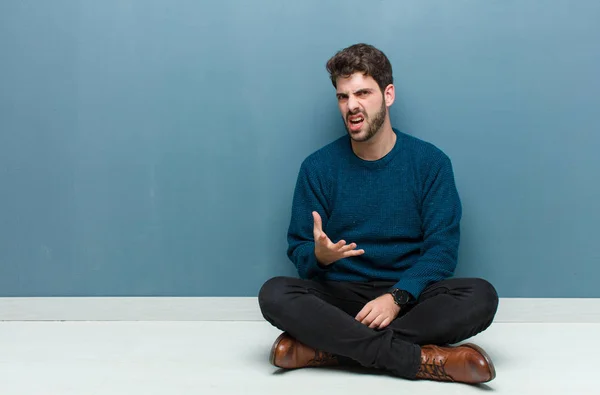 Young Handsome Man Sitting Floor Looking Angry Annoyed Frustrated Screaming — Φωτογραφία Αρχείου