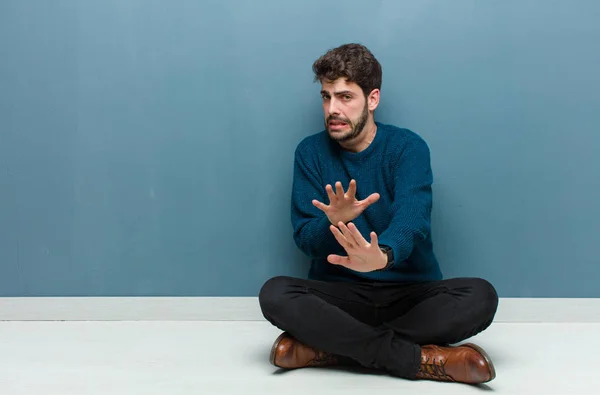 Young Handsome Man Sitting Floor Feeling Disgusted Nauseous Backing Away — Stock Photo, Image