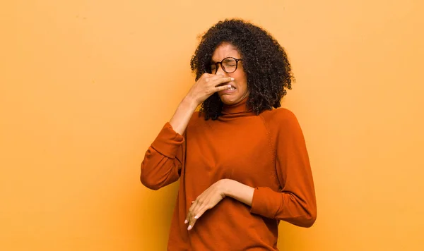 Young Pretty Black Woman Feeling Disgusted Holding Nose Avoid Smelling — ストック写真