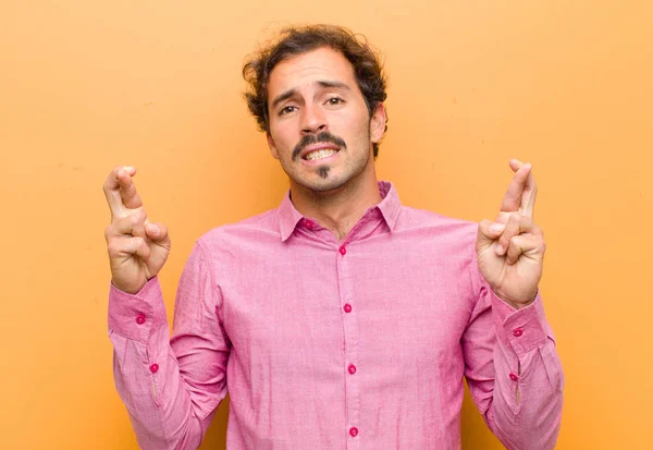 Young Handsome Man Crossing Fingers Anxiously Hoping Good Luck Worried — Stock Photo, Image