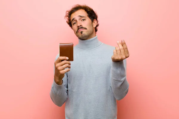 Young Handsome Man Wallet Pink Flat Wall — Stock Photo, Image