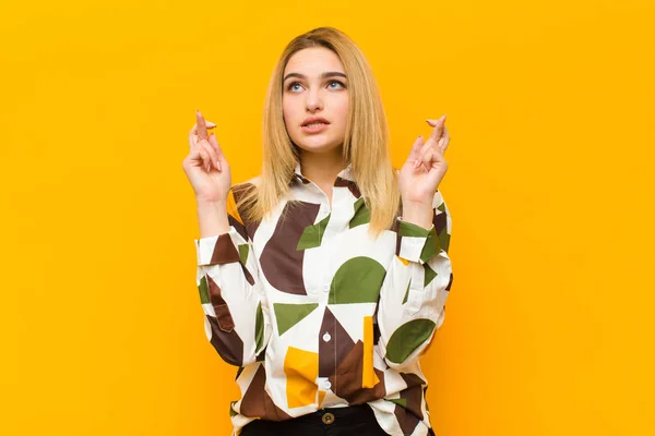 Young Blonde Pretty Woman Crossing Fingers Anxiously Hoping Good Luck — Stock Photo, Image