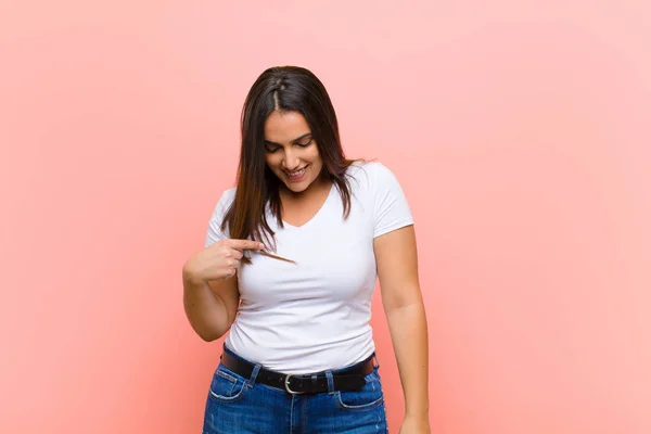 Young Pretty Hispanic Woman Smiling Cheerfully Casually Looking Downwards Pointing — Stock Photo, Image
