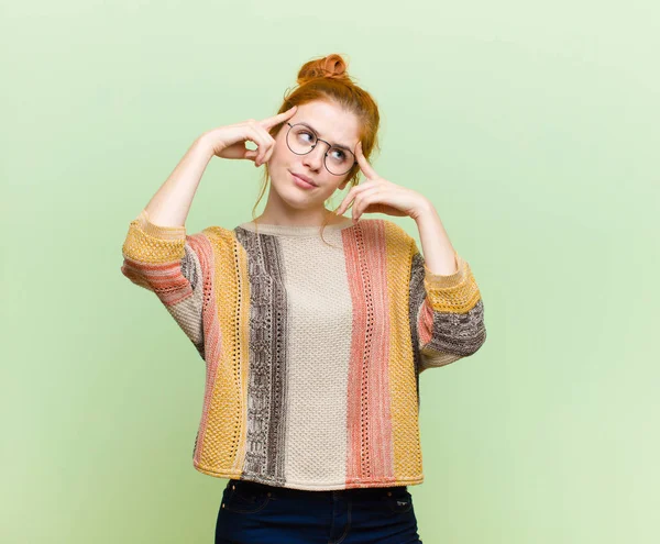 Young Pretty Red Head Woman Looking Concentrated Thinking Hard Idea — Stockfoto