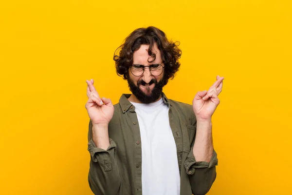Young Crazy Man Feeling Nervous Hopeful Crossing Fingers Praying Hoping Royalty Free Stock Photos