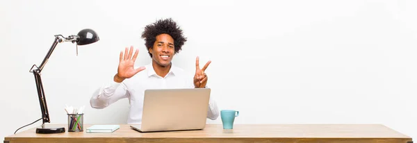 Young Black Businessman Smiling Looking Friendly Showing Number Seven Seventh — Stock Photo, Image