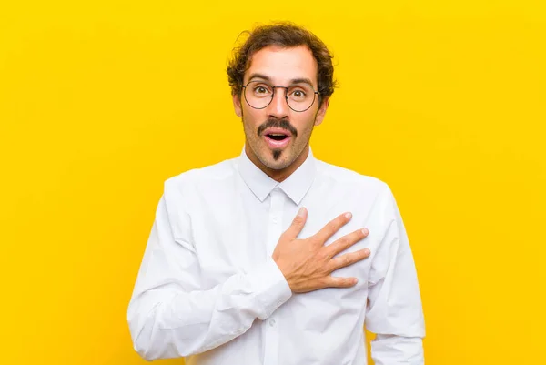 Young Handsome Man Feeling Shocked Surprised Smiling Taking Hand Heart — Stock Photo, Image