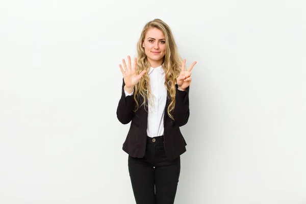 Young Blonde Woman Smiling Looking Friendly Showing Number Seven Seventh — Stock Photo, Image